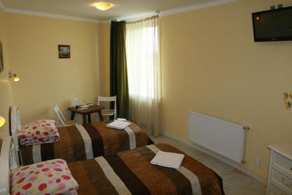 Hotel Vaivorykste Šiauliai Pokoj fotografie